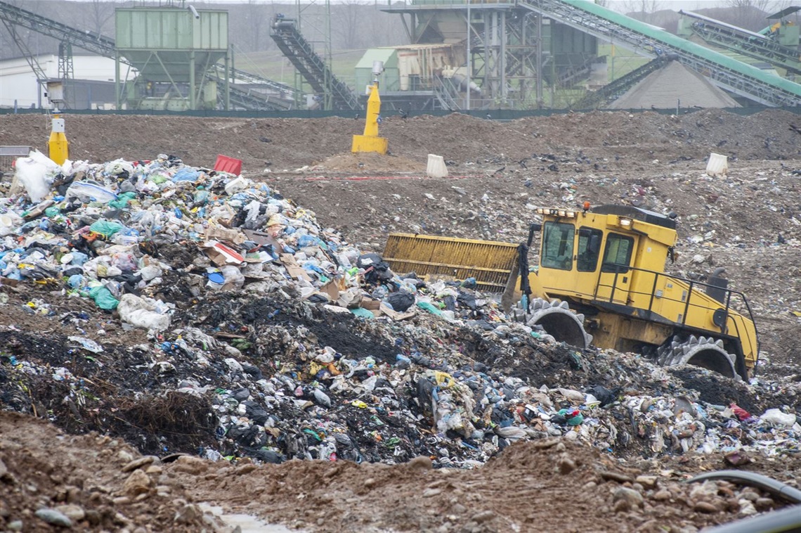 Photo of a Garbage Truck with Garbage